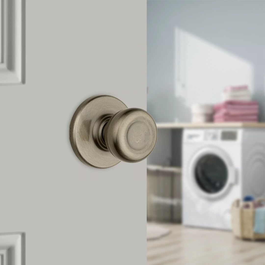 Kwikset Hall/Closet Antique Brass Tylo Door Knob