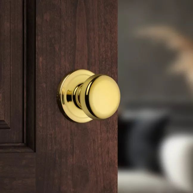 Kwikset Polished Brass Juno Knob Hall/Closet