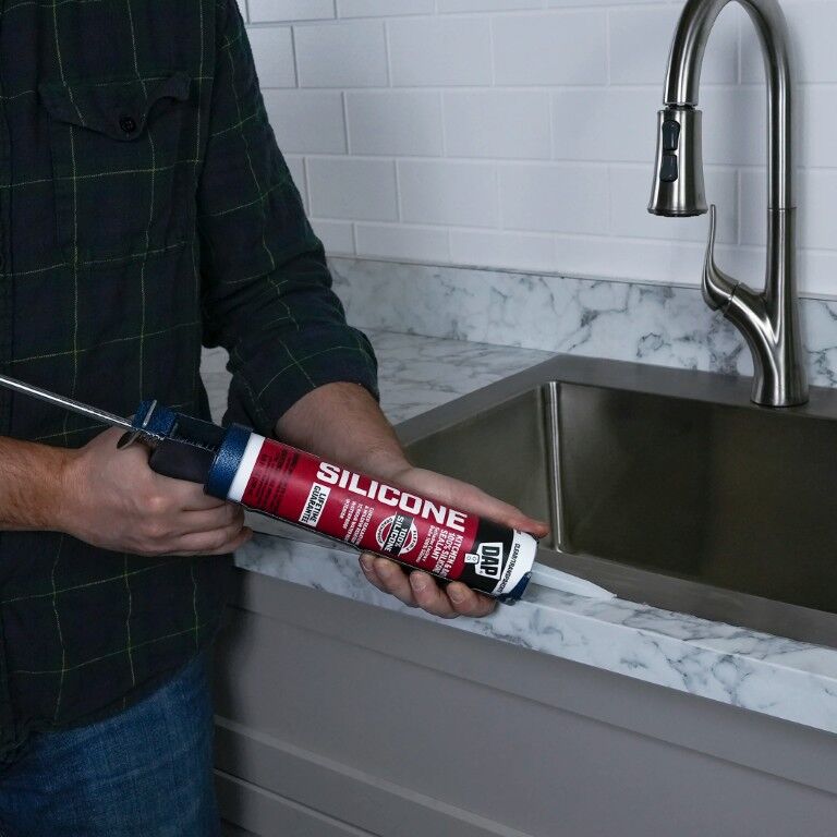 DAP 100% Silicone Rubber Clear Kitchen, Bath, & Plumbing Sealant, 9.8-Oz